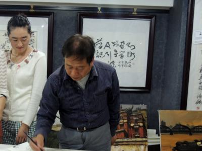 說毛斌智畫中濃郁的生活氣息