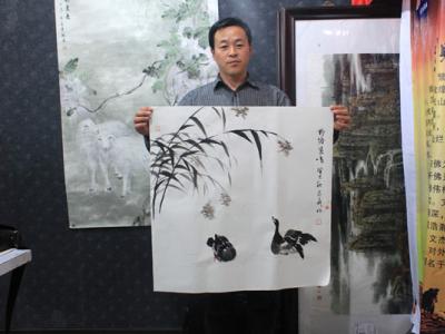 王召義筆會現(xiàn)場繪《野塘雁鳴》