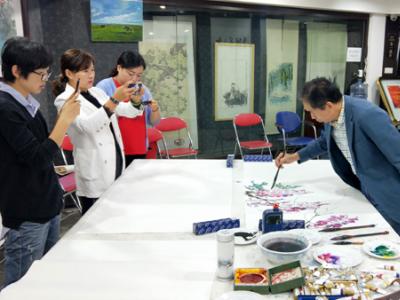 紫藤丹青畫 花蔓宜陽春——孫德善先生“墨飛色舞 盛世同慶?成功美術館‘喜迎國慶70周年書畫邀請展’ ”筆會作品賞析